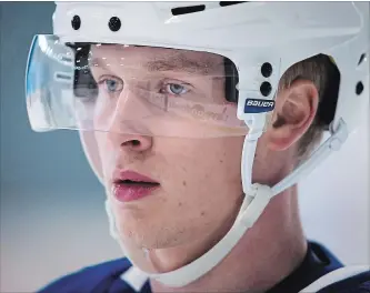  ?? DARRYL DYCK THE CANADIAN PRESS ?? Vancouver Canucks centre Elias Pettersson, of Sweden, says the key to recovering from his first concussion has been taking it “day-by-day.” Still, he hopes he never has to go through the NHL’s concussion protocol again.