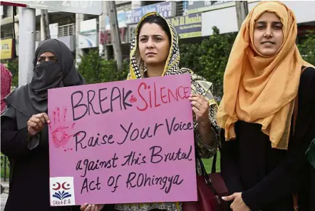  ?? — AP ?? Demand for action: Members of Pakistani civil society groups protesting against the persecutio­n of Myanmar’s Rohingya Muslim minority in Islamabad, Pakistan, two days ago.