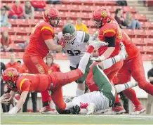  ?? FILE PHOTO ?? Fifth-year Calgary Dinos safety Michael Schmidt, left, will get one more opportunit­y to beat the Quebec conference champion Laval Rouge et Or in Saturday’s Mitchell Bowl at McMahon Field.