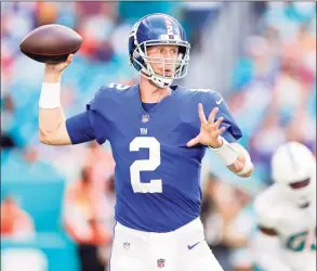  ?? Michael Reaves / TNS ?? New York Giants quarterbac­k Mike Glennon throws a pass in the third quarter against the Miami Dolphins last Sunday.