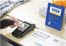  ??  ?? As the payments industry increasing­ly shifts from plastic to digital, new technology advances from Visa and its partners are bringing consumers a simple and secure purchasing experience.