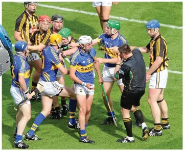 ?? SPORTSFILE ?? Heated: a scuffle breaks out in the 2011 All-Ireland final