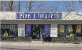  ?? JULIE JACOBSON/AP ?? A customer steps out of a Pier 1 Imports store that was having a closeout sale on Monday in Larchmont, New York.