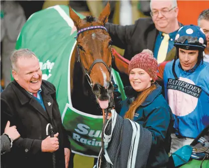  ??  ?? Andrew
Gemmell (left), with strapper Laura Scrivenor and jockey Aidan Coleman, after Paisley Park won the Stayers’ Hurdle during this year’s Cheltenham Festival.