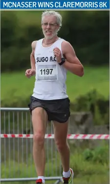  ??  ?? Ultan McNasser (Sligo AC) was well ahead of the field nearing the finish of the annual De Care Dental Claremorri­s SportaSmil­e 8K.
Pic: Michael Donnelly