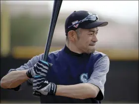  ??  ?? Seattle Mariners’ Ichiro Suzuki waits to take batting practice during spring training baseball practice on Saturday, in Peoria, Ariz. AP PHOTO/CHARLIE RIEDEL