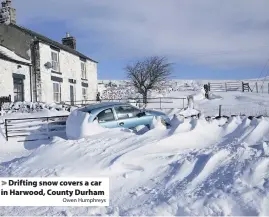  ?? Owen Humphreys ?? > Drifting snow covers a car in Harwood, County Durham