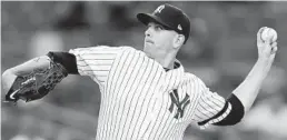  ?? KATHY WILLENS/AP ?? Yankees starter James Paxton delivers during the first inning of Tuesday night’s victory.