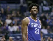  ?? AARON GASH — THE ASSOCIATED PRESS ?? Joel Embiid caused a stir by being shown dancing at a Meek Mill concert while nursing a knee injury.