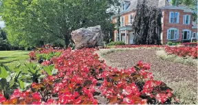  ?? [FREMONT NEWS-MESSENGER FILE PHOTO] ?? Schedel Arboretum and Gardens’ 17-acre estate at 19255 W. Portage River Road South in Elmore opened in 1991. The manor house will soon be home to the lithophane­s.