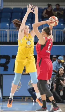  ?? GETTY IMAGES ?? Stefanie Dolson (left) got in foul trouble and played just 10-plus minutes in the costly loss to the Aces. Liz Cambage (right) was a thorn in the Sky’s side.