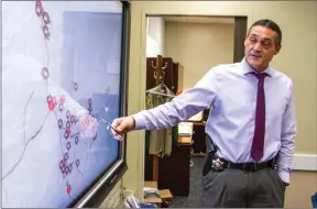  ?? Austin Dave/The Signal ?? Lt. Ignacio Somano explains a crime trend of vehicle thefts over the last week using a SMART Board in the captain’s conference room at the SCV Sheriff’s Station.