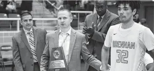  ?? ?? Brennan coach Koty Cowgill, left, will have many returning players next season after the Bears’ bid to return to the state tournament for the first time since 2013 fell short on Saturday.