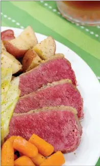  ?? TRIBUNE CONTENT AGENCY ?? Put a twist on a traditiona­l dish: Try glazed corned beef and caramelize­d cabbage.