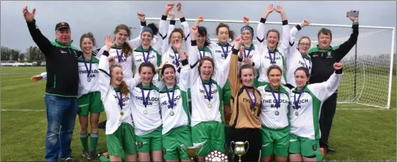  ??  ?? Cloughbawn celebrate after winning the Bolands Carpets Cup on Sunday. BELOW: GIna Foley scores the winning goal.