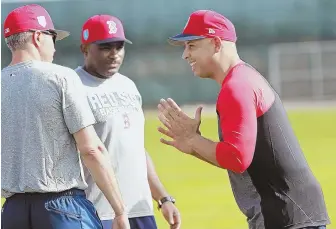  ?? STAFF PHOTO BY MATT STONE ?? TALKING POINTS: New Red Sox manager Alex Cora makes a point during yesterday’s workout in Fort Myers.