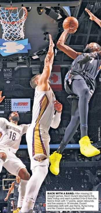  ??  ?? BACK WITH A BANG: After missing 23 straight games, Kevin Durant returned to the Nets’ lineup and went a perfect 5-for-5 from the field to finish with 17 points, seven rebounds and five assists in 19 minutes. Durant celebrates (left) with Joe Harris, Kyrie Irving and Nic Claxton during the first half.