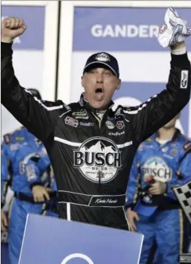  ?? JOHN RAOUX — THE ASSOCIATED PRESS ?? Kevin Harvick celebrates in Victory Lane after winning the first of two qualifying for the NASCAR Daytona 500 at Daytona Internatio­nal Speedway on Feb. 14 in Daytona Beach, Fla.