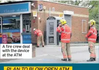  ??  ?? A fire crew deal with the device at the ATM