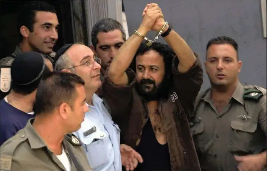  ?? PICTURE: MOTI KIMCHE ?? Imprisoned Palestinia­n leader Marwan Barghouthi during a court appearance in 2003.