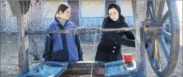  ?? Sundance Selects ?? CRISTINA FLUTUR, left, and Cosmina Stratan in the film “Beyond the Hills,” directed by Cristian Mungiu.