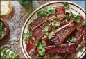  ?? MELINA HAMMER / THE NEW YORK TIMES ?? Chinesesty­le barbecued ribs.