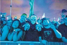  ?? PATRICK CONNOLLY/ORLANDO SENTINEL ?? Ravers dance to electronic music at EDC Orlando, the Electric Daisy Carnival, at Tinker Field on Nov. 8, 2019.