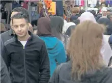  ?? THE ASSOCIATED PRESS FILES ?? This image taken from video shows Salah Abdeslam, left, before his arrest for his alleged role in the Nov. 13 Paris attacks. Abdeslam appeared in court on Monday but refused to answer questions.