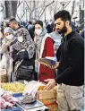  ?? ARASH KHAMOOSHI FOR THE NEW YORK TIMES ?? Iran’s economy has been hurt by harsh Western sanctions. A market in Tehran in January.