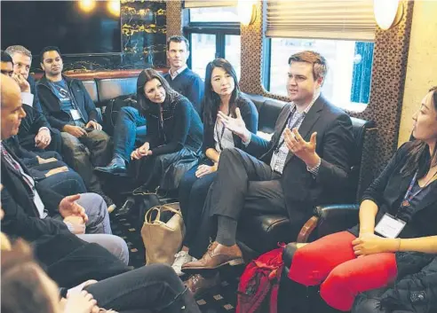  ?? ANDREW SPEAR/THE NEW YORK TIMES ?? J.D. Vance speaks with venture capitalist­s during a 2018 bus tour in Youngstown, Ohio.