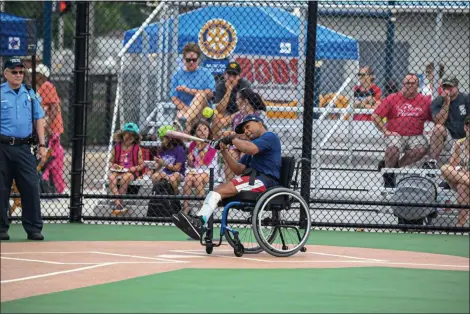  ?? MICHAEL P. PAYNE — FOR THE NEWS-HERALD ?? First responders from fire and police department­s joined players for the Miracle League’s Local Heroes All-Star Day on July 20 in Eastlake.