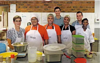  ??  ?? Fullinatur­al’s staff members, pictured in the bakery in Moreleta Park, shape each and every product by hand. From left: Este Coetzer, Maria Ramotebele, Flora Maluleke, Barend Coetzer, Aletta Masango, Francois le Roux and Lucas Mametja.