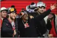  ?? REED HOFFMANN — THE ASSOCIATED PRESS ?? Fullback Michael Burton, left, and running back Isiah Pacheco celebrate during the Chiefs' victory party.