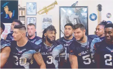  ?? MARLA BROSE/JOURNAL ?? The Duke City Gladiators take part in a news conference at The Grill on San Mateo prior to their Champions Indoor Football title game at Tingley Coliseum on tonight. In front from left, Jayson Serda (20), Fred Griggs (3) and Chris Gomez (55).