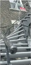  ?? VINCENZO D’ALTO, MONTREAL GAZETTE FILES ?? A for-rent sign sits atop the exterior winding stairs of a Montreal home.