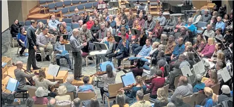  ?? Photos provided by Augustana Arts ?? The Stratus Chamber Orchestra rehearses at its home base, Augustana Lutheran Church, pre- COVID- 19.