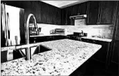  ?? BUKHAROVA/ISTOCKPHOT­O ?? The right countertop, like this quartz example, can lend functional­ity and style to your kitchen.