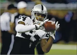  ?? CARLOS OSORIO — THE ASSOCIATED PRESS, FILE ?? Former Raiders free safety Charles Woodson was among four first-time eligible players for enshrineme­nt to the Pro Football Hall of Fame on Tuesday.