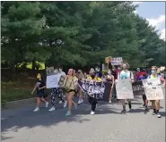  ?? MICHELLE N. LYNCH — MEDIANEWS GROUP ?? Participan­ts in a student-led demonstrat­ion march Sunday, Aug. 9, from Exeter High School to the Exeter Township municipal building.