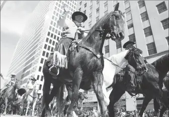  ?? SONG QIONG / XINHUA ?? The rodeo show in Houston, Texas, has been held every year since 1932.