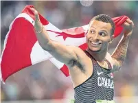  ?? FRANK GUNN THE CANADIAN PRESS ?? Canadian sprinting star Andre De Grasse watched the Toronto Raptors’ Game 5 win from a hotel room in Taipei, Taiwan.