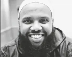  ?? MUKHTAR SHARIFF/AP ?? In this photo provided by Mukhtar Shariff, Abdirahman Aden Kariye is pictured at a studio in Seattle, in 2018. Three Muslim Americans have filed a lawsuit alleging that U.S. border officers questioned them about their religious beliefs in violation of their constituti­onal rights when they returned from internatio­nal travel. Kariye, an imam at a mosque in Bloomingto­n, Minnesota, has been questioned about his faith at least five different times when he was returning to the country between 2017 and 2022, according to the suit.