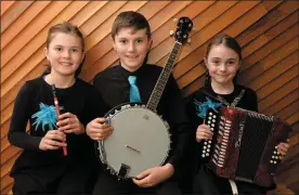  ?? Photos by Declan Malone ?? RIGHT: Aoife and her brother Pádraig Ó Muircheart­aigh and Aisling Ní Bhriain at the West Kerry Scór na bPáistí finals.