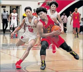  ?? Luis Sinco Los Angeles Times ?? “IT’S BEEN a great journey, and I want to finish it off,” says Fairfax guard Ethan Anderson, shown protecting the ball from Kevin Bethel of Westcheste­r.