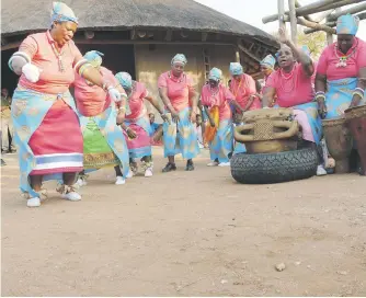  ?? Picture: Amanda Watson ?? CALLING BACK THE PAST. Members of the Dikakapa traditiona­l dance troupe perform in Mapungubwe National Park.