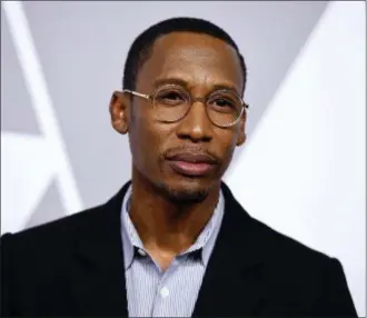  ?? PHOTO BY JORDAN STRAUSS — INVISION — AP, FILE ?? In this file photo, Raphael Saadiq arrives at the 90th Academy Awards nominees luncheon in Beverly Hills Saadiq along with Taura Stinton and Mary J. Blige are nominated for an Oscar for original song for “Mighty River,” from the film “Mudbound.”