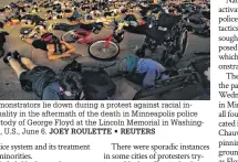  ?? JOEY ROULETTE • REUTERS ?? Demonstrat­ors lie down during a protest against racial inequality in the aftermath of the death in Minneapoli­s police custody of George Floyd at the Lincoln Memorial in Washington, U.S., June 6.