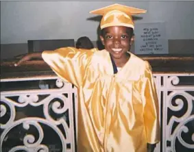  ?? Courtesy of Malika Williams ?? Malika Williams’ son, Dalon was killed at age 17 in Garfield after he got off a van for a court-ordered program Monday night. Pictured is Dalon when he graduated from kindergart­en.