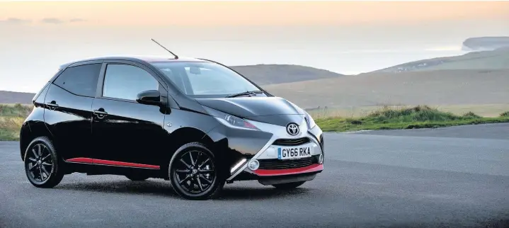  ??  ?? The Aygo’s face is funky thanks to a red bumper insert and silver front X