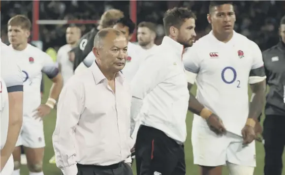  ??  ?? 2 Eddie Jones with his England players after their defeat at Ellis Park. The Australian said the game had set up the threetest series ‘fantastica­lly well’.